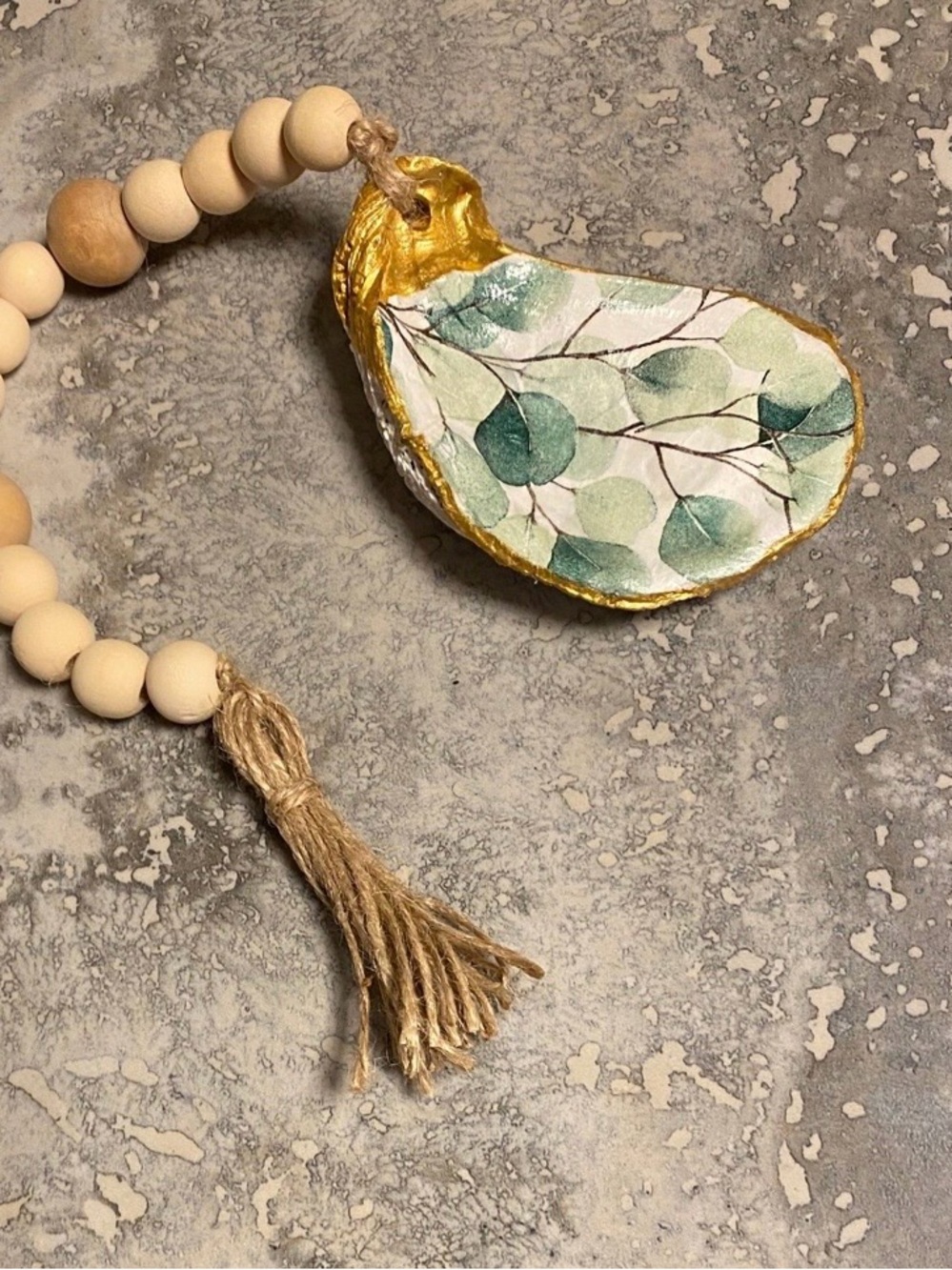 Eucalyptus oyster shell beaded garland with tassel